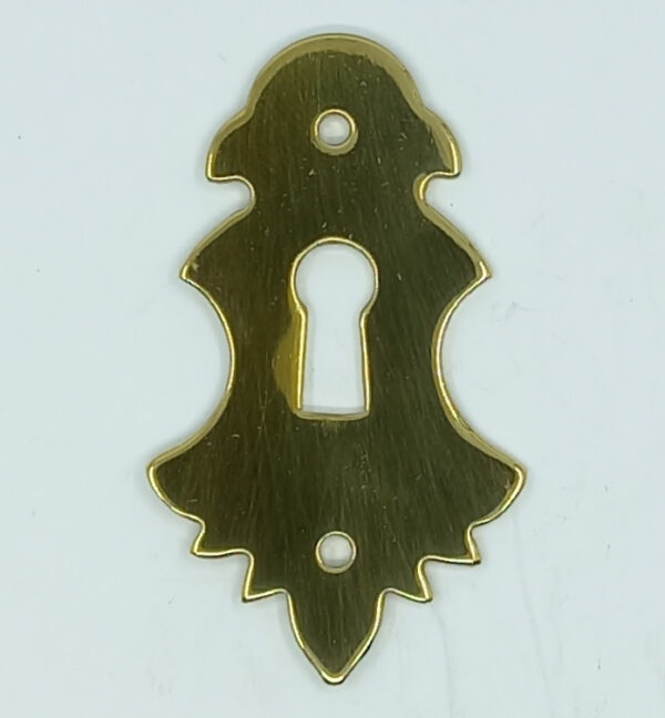 Entrée laiton 20.166.1 Rustique, polie, 49x28mm, trou de clé 13mm.