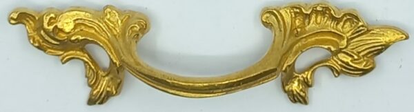 Poignée laiton 24.609 bronze Ls XV, poli, dim. 95x28 ou 138x35mm.