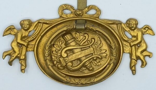 Poignée laiton 24.707.1  bronze Ls XVI, poli, dim. 118x62mm, attache à lacet.