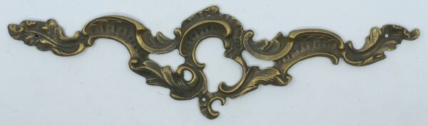 Tablier bronze 30.315.1  Louis XV, patiné, dim. 250x70mm.