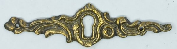 Entrée laiton 20.434.1 bronze patiné,  26x99mm, pour tiroir, Louis XV.