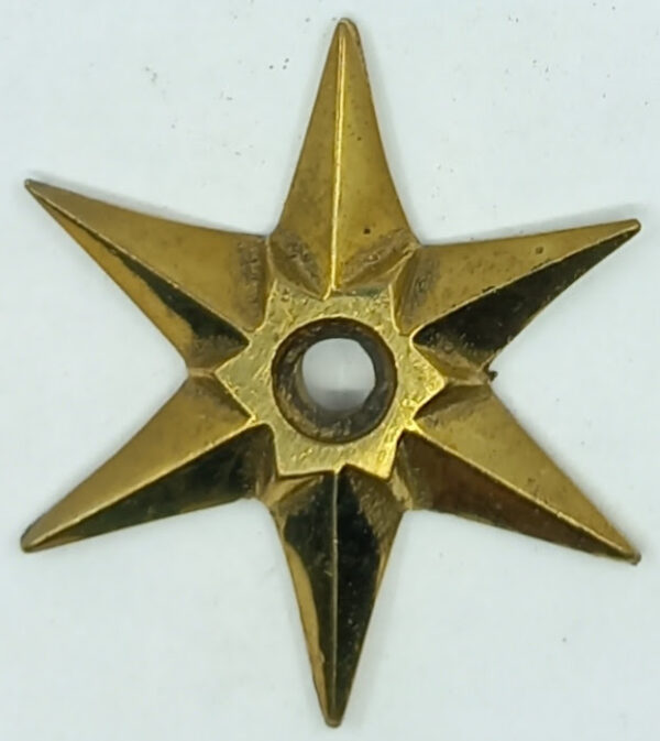 Rosace laiton 18.347.1 bronze poli, Empire, étoile diam. 47mm, trou 5mm.