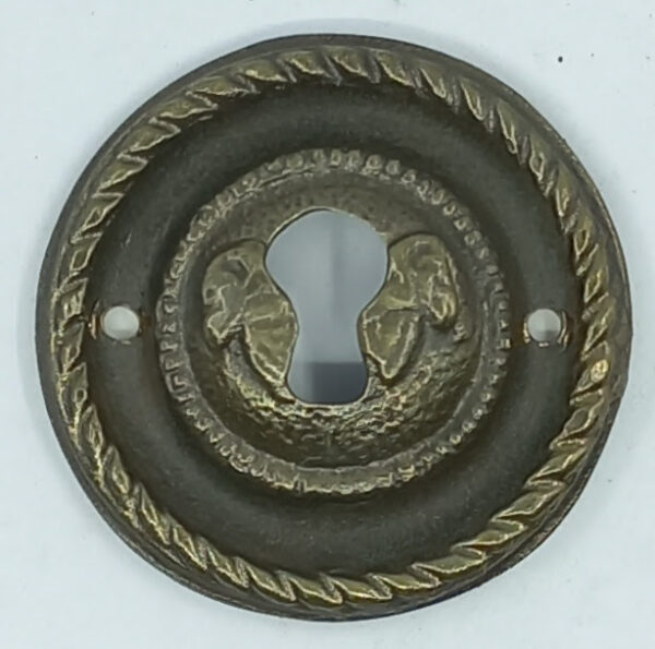 Entrée laiton 20.575.1 bronze, patiné, Louis XVI, diam. 40mm.