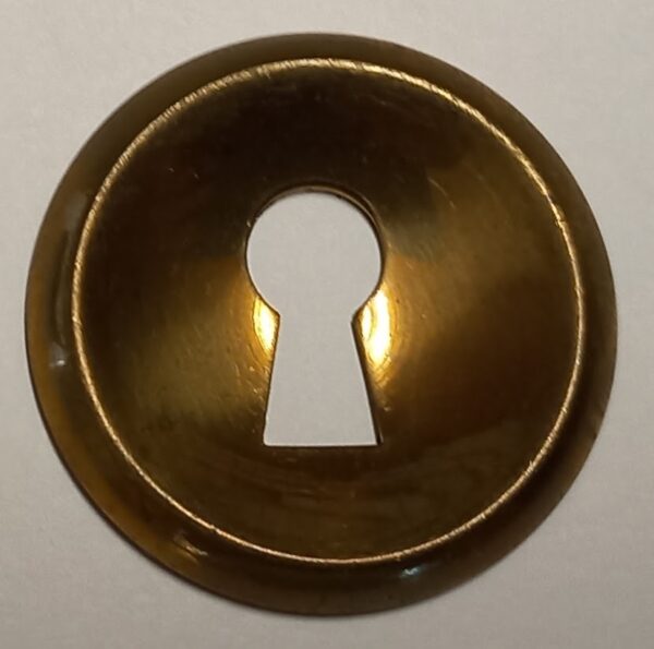 Entrée laiton 20.702.1 poli, diam.30mm, concave, Louis Philippe, sans trou de vis.