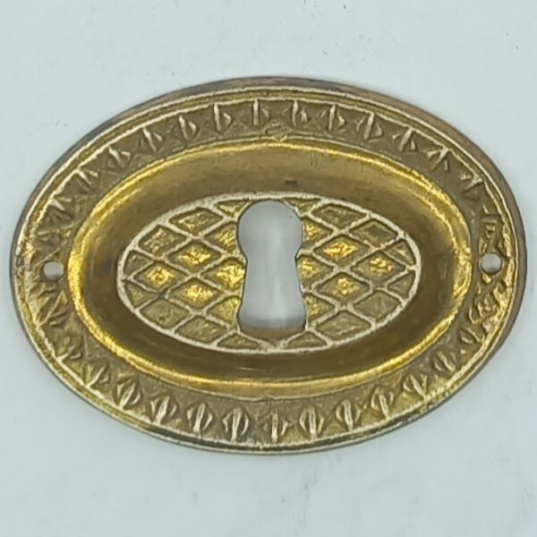 Entrée laiton 20.591.1 bronze, patiné,  Louis XVI, 40x48mm.