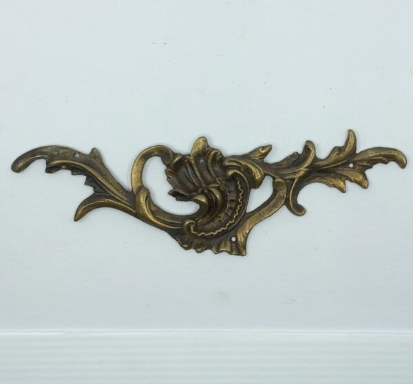 Tablier bronze 30.317.1  Louis XV, patiné, dim. 215x65mm.