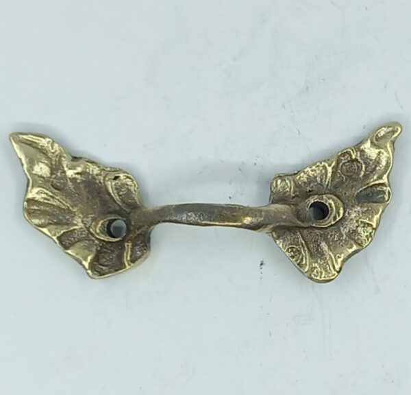 Poignée laiton 24.614.1  bronze Ls XV, patiné, dim. 48x20mm.